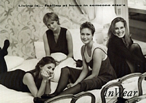 In Wear b/w girlfriends on bed postcard 1994