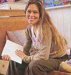 danish Foraeldre og BORN March 2004 - sitting on bed with book in hands
