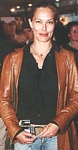 danish HER OG NU 22. June 2005 - brown leather jacket, jeans, hair back