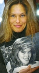 danish Arhus Stiftstidende 12. May 2005 - holding a b/w pic of herself in hands
